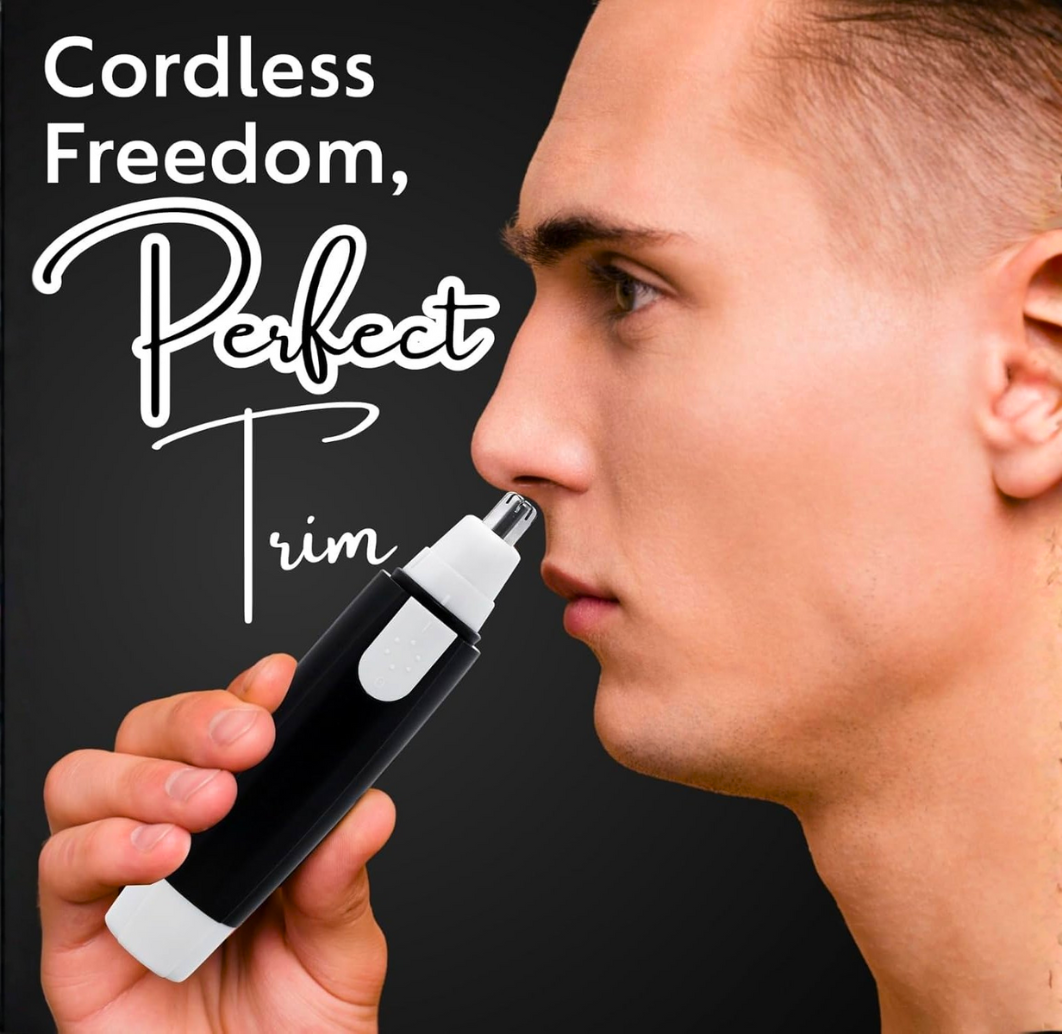 Man using a cordless nose hair trimmer for precise grooming.